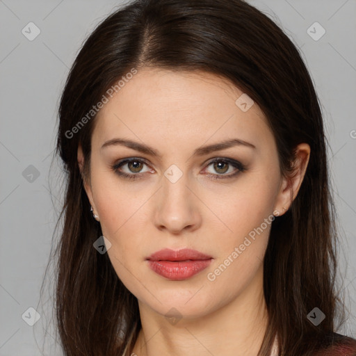 Neutral white young-adult female with long  brown hair and brown eyes