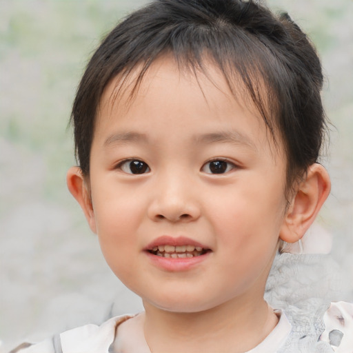 Joyful asian child female with medium  brown hair and brown eyes