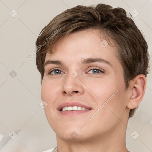 Joyful white young-adult female with short  brown hair and grey eyes