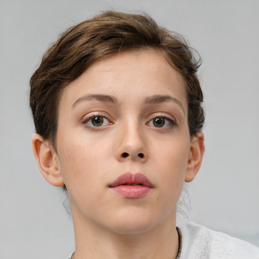 Neutral white young-adult female with short  brown hair and brown eyes