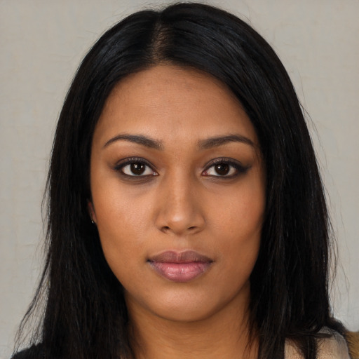 Neutral black young-adult female with long  black hair and brown eyes