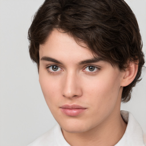 Neutral white young-adult male with medium  brown hair and brown eyes