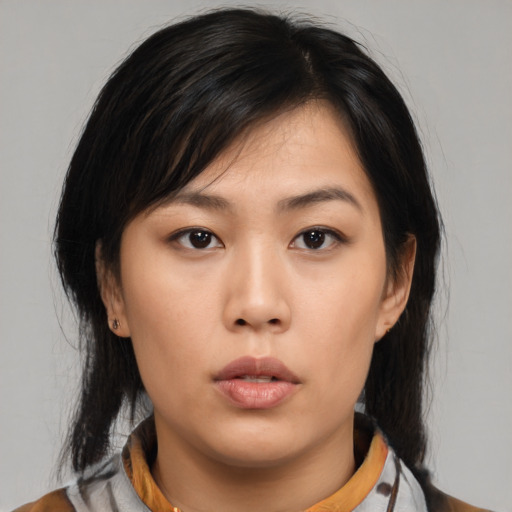 Neutral asian young-adult female with medium  black hair and brown eyes