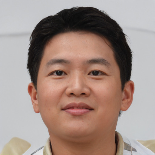 Neutral asian young-adult male with short  brown hair and brown eyes