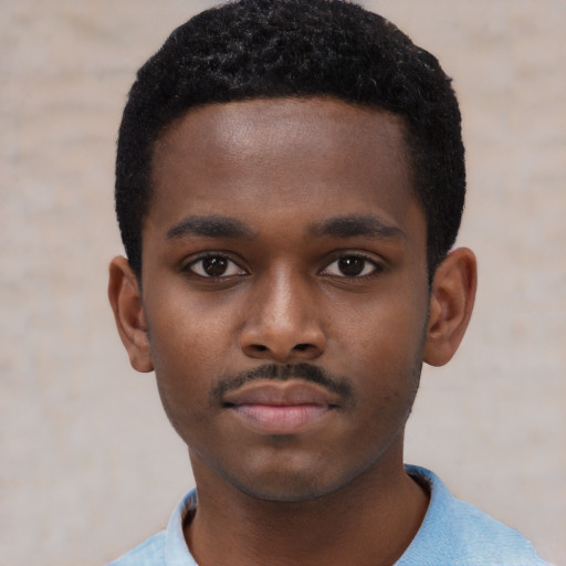 Neutral black child male with short  black hair and brown eyes