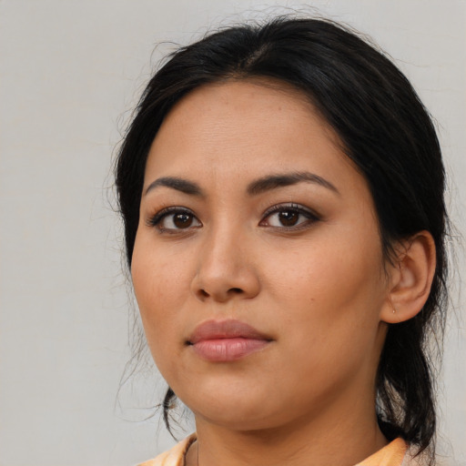 Neutral asian young-adult female with medium  black hair and brown eyes