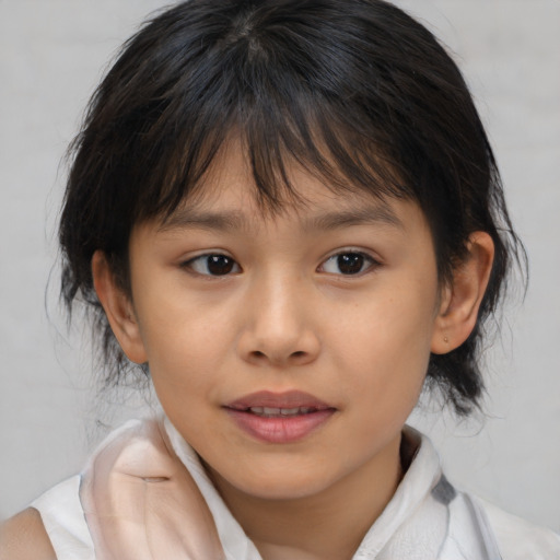 Joyful asian child female with medium  brown hair and brown eyes