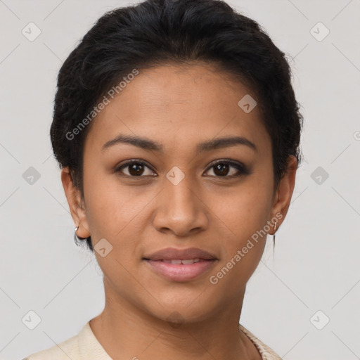 Joyful latino young-adult female with short  brown hair and brown eyes