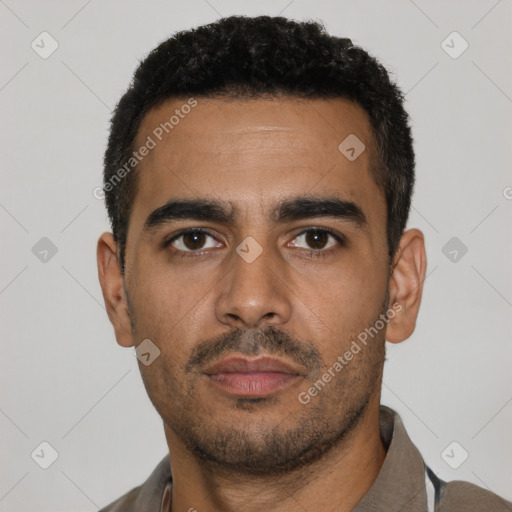 Neutral latino young-adult male with short  black hair and brown eyes