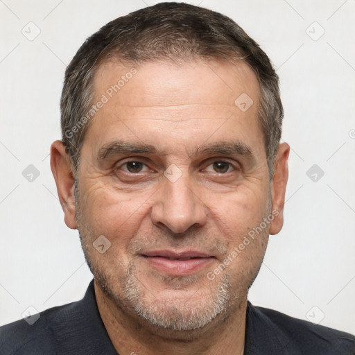 Joyful white adult male with short  brown hair and brown eyes