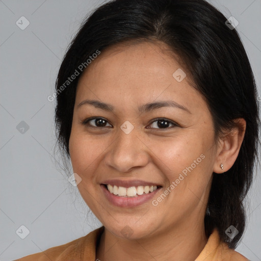 Joyful white adult female with medium  brown hair and brown eyes