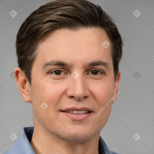 Joyful white adult male with short  brown hair and brown eyes