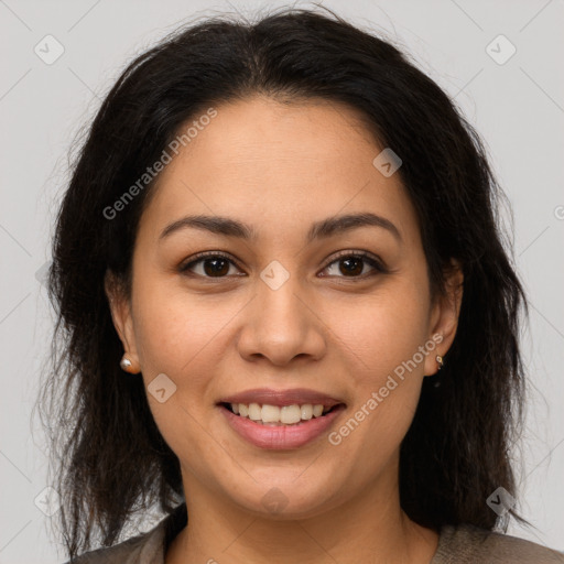 Joyful latino young-adult female with long  brown hair and brown eyes