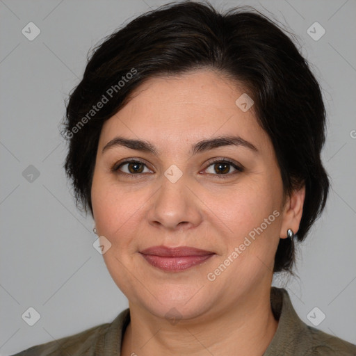 Joyful white adult female with medium  brown hair and brown eyes