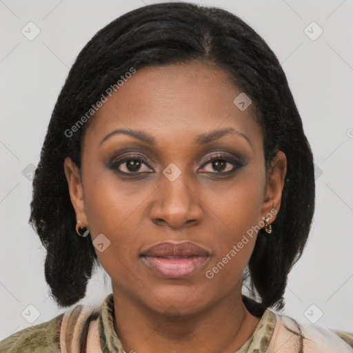 Joyful black young-adult female with medium  brown hair and brown eyes