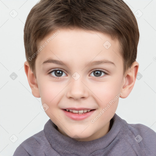 Joyful white child male with short  brown hair and brown eyes