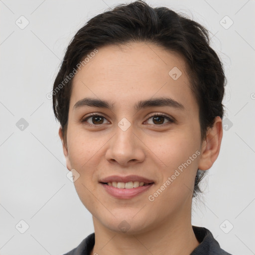 Joyful white young-adult female with short  brown hair and brown eyes