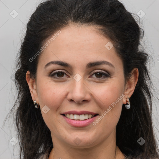 Joyful white adult female with long  brown hair and brown eyes