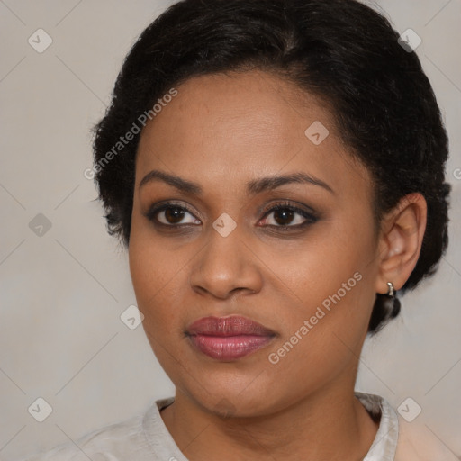 Joyful black young-adult female with medium  brown hair and brown eyes