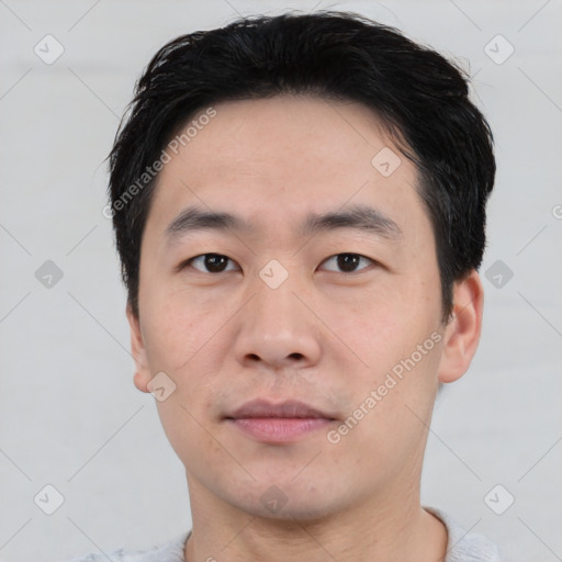 Neutral asian young-adult male with short  black hair and brown eyes