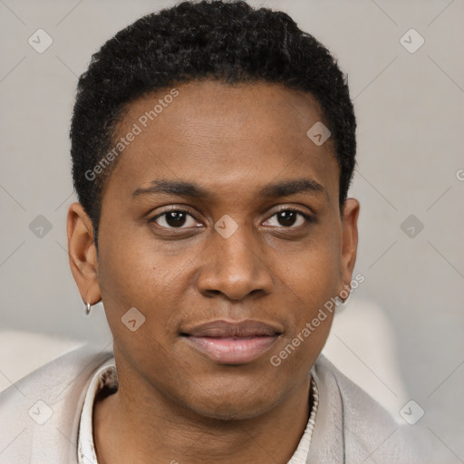 Joyful black young-adult male with short  brown hair and brown eyes