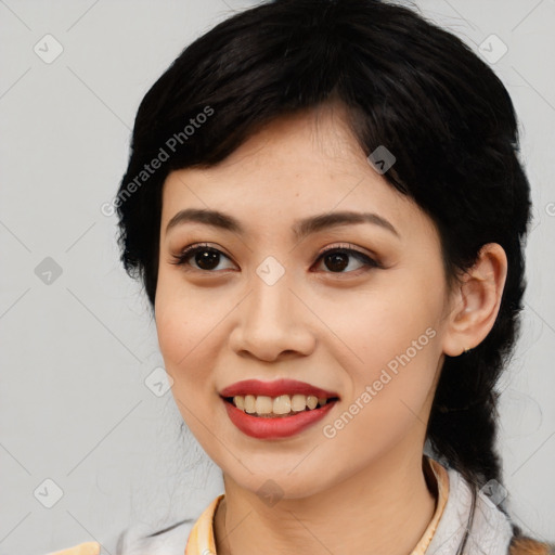 Joyful asian young-adult female with medium  black hair and brown eyes