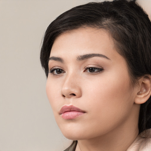 Neutral white young-adult female with medium  brown hair and brown eyes