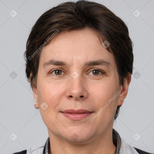 Joyful white adult female with short  brown hair and grey eyes