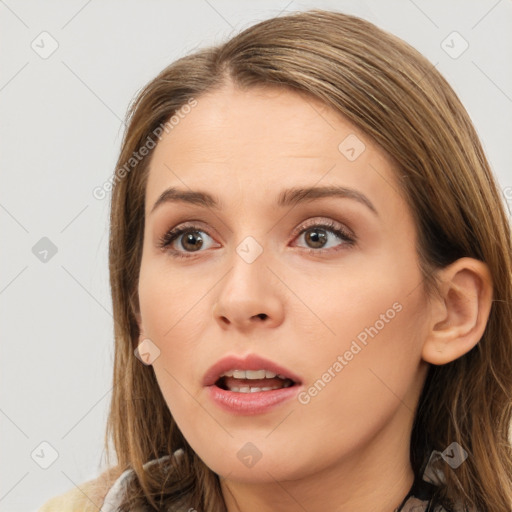 Neutral white young-adult female with long  brown hair and brown eyes