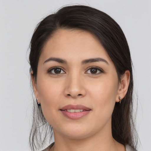 Joyful asian young-adult female with long  brown hair and brown eyes