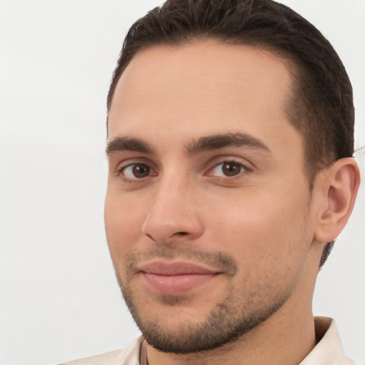 Joyful white young-adult male with short  brown hair and brown eyes