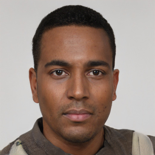 Neutral black young-adult male with short  black hair and brown eyes
