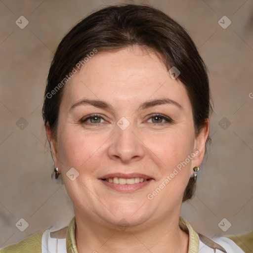 Joyful white adult female with medium  brown hair and brown eyes