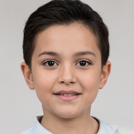 Joyful white child female with short  brown hair and brown eyes