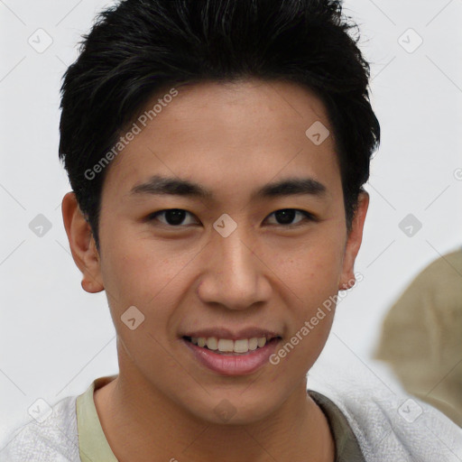 Joyful asian young-adult male with short  black hair and brown eyes