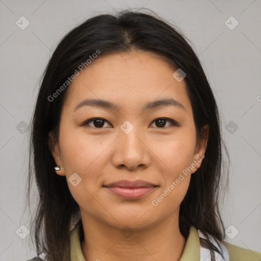 Joyful latino young-adult female with medium  brown hair and brown eyes