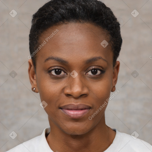 Joyful black young-adult female with short  black hair and brown eyes