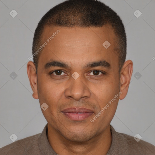 Joyful latino young-adult male with short  brown hair and brown eyes