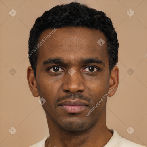 Neutral black young-adult male with short  black hair and brown eyes