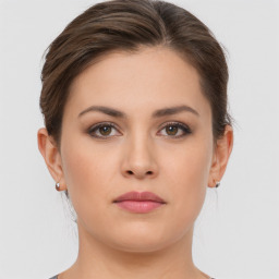 Neutral white young-adult female with short  brown hair and brown eyes