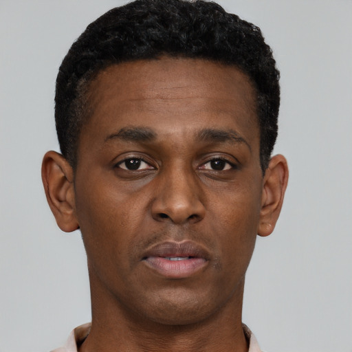 Neutral black young-adult male with short  brown hair and brown eyes