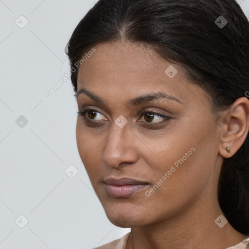 Neutral white young-adult female with long  brown hair and brown eyes