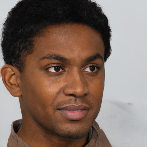 Neutral black young-adult male with short  brown hair and brown eyes