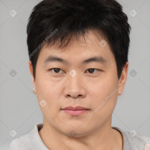 Neutral asian young-adult male with short  brown hair and brown eyes