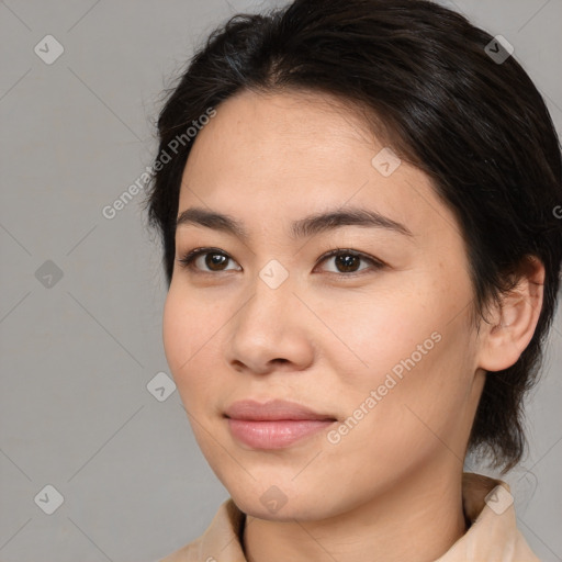 Joyful asian young-adult female with medium  brown hair and brown eyes