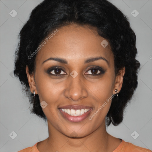 Joyful black young-adult female with medium  black hair and brown eyes