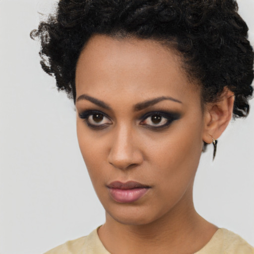 Neutral black young-adult female with short  black hair and brown eyes