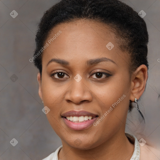 Joyful black young-adult female with short  brown hair and brown eyes