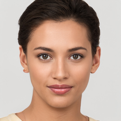 Joyful white young-adult female with short  brown hair and brown eyes