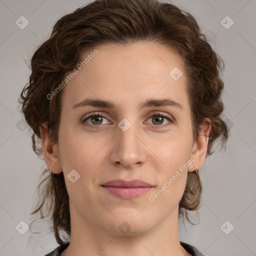 Joyful white young-adult female with medium  brown hair and green eyes